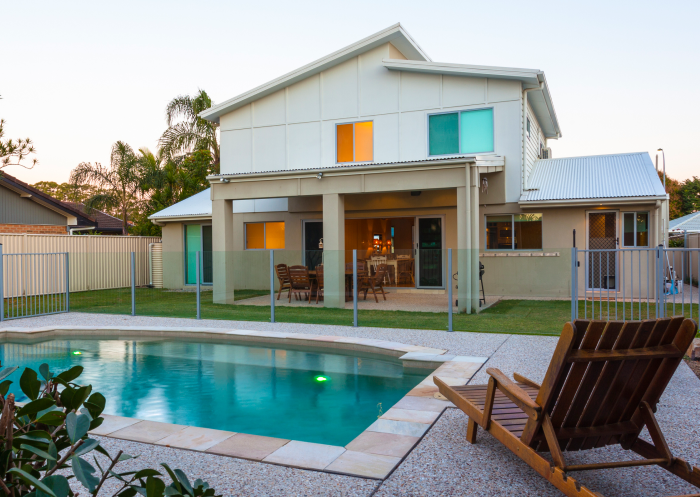 Compliant pool barrier and self-closing gate
